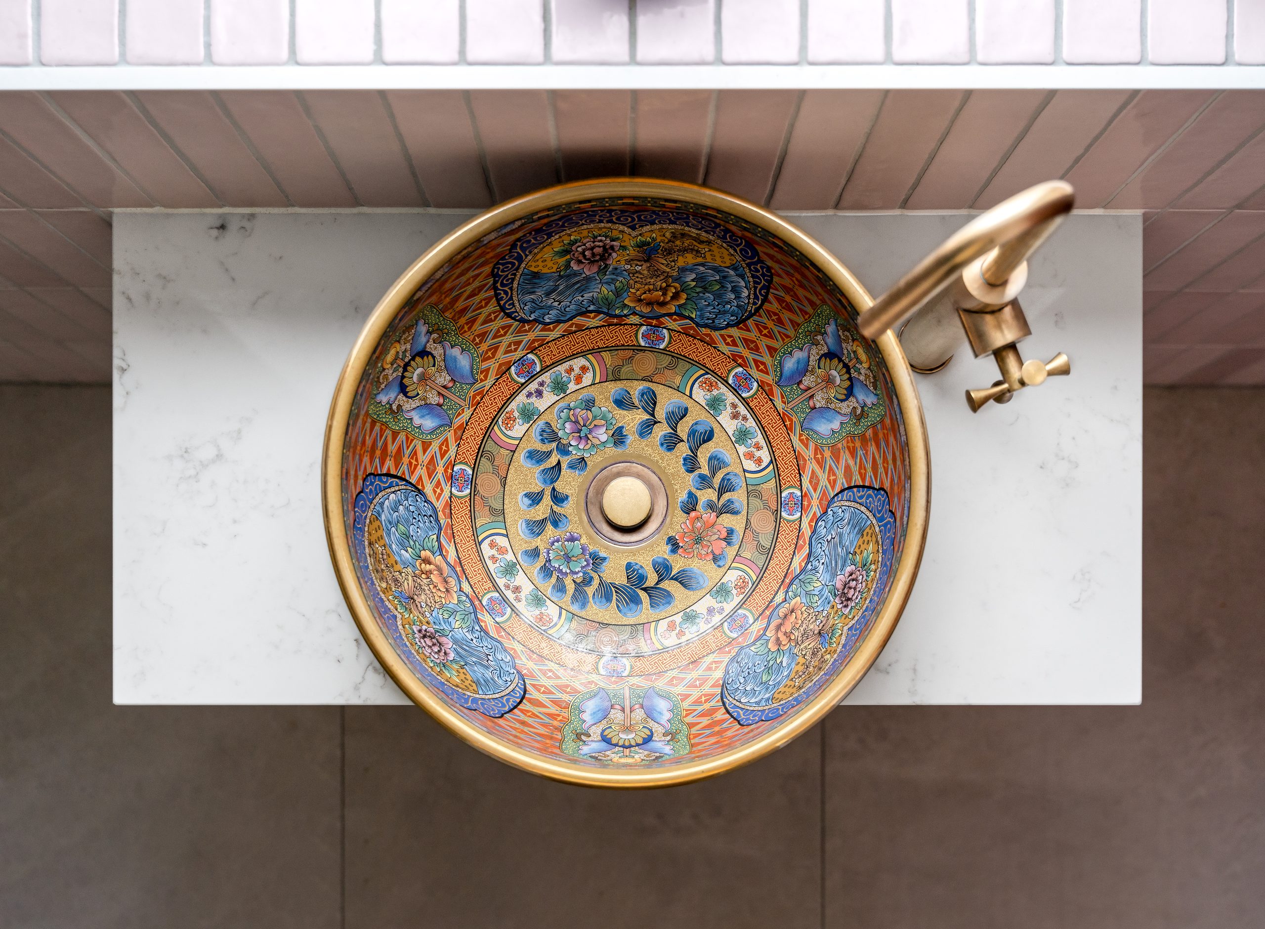 London Basin Company patterned basin on marble vanity, seen from above
